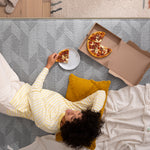 Load image into Gallery viewer, Woman eating pizza on Hybrid Firm Mattress
