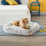 Load image into Gallery viewer, Dog in dog bed on rug next to mattress
